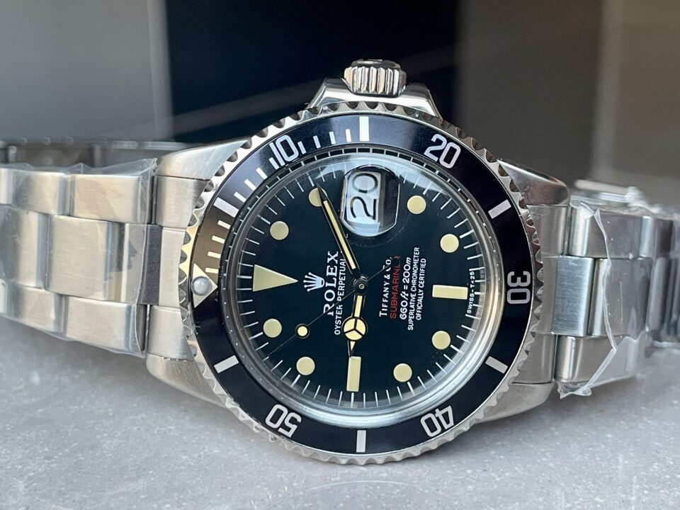 VINTAGE Rolex Submariner Date Tiffany & Co 16610A30B9315 Black dial with SS bracelet