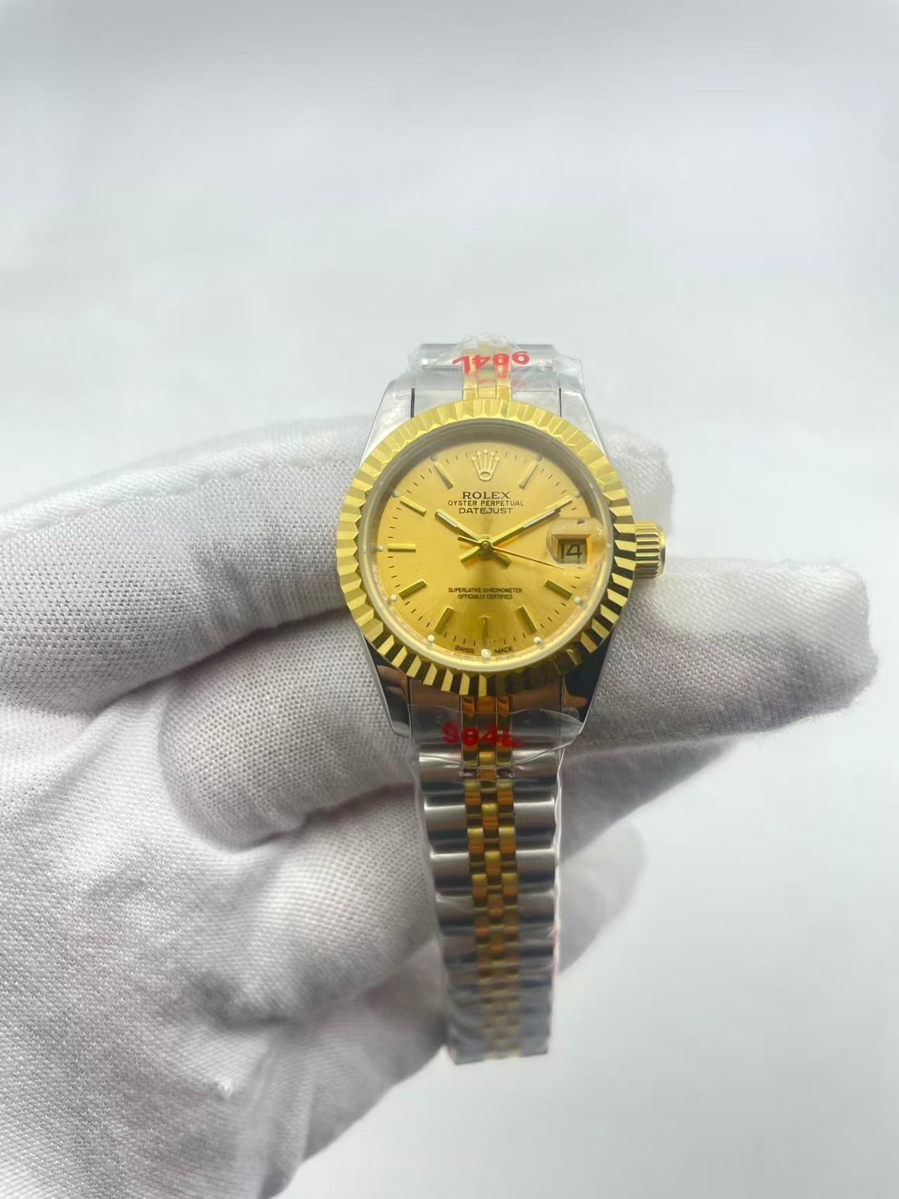 Rolex Lady-Datejust Steel and Yellow Gold Champagne Index Dial  Ref.69173